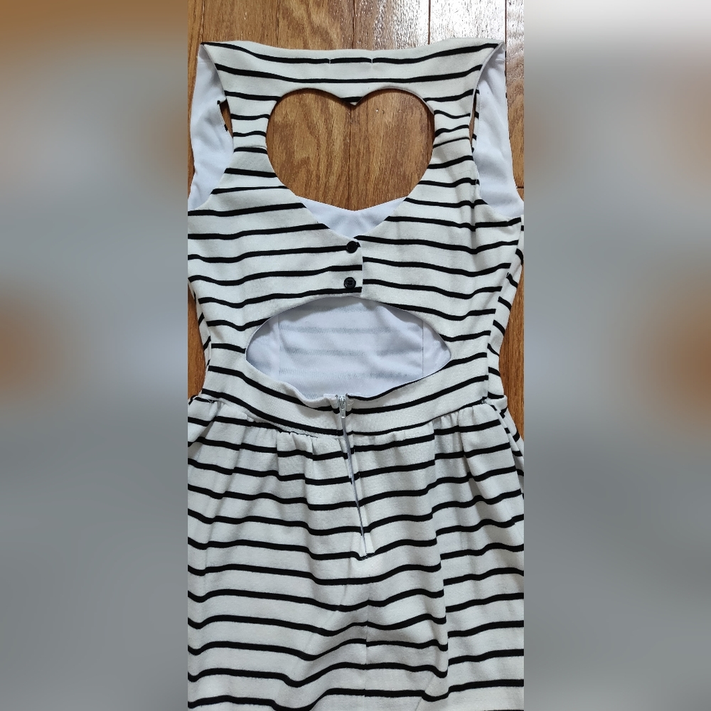Black and white striped dress with heart shape cut out in the back